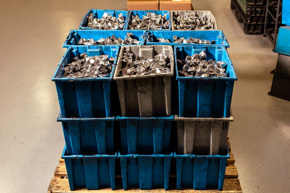 GP2-bins-on-skid-2-cropped Cost-effective powdered metal parts