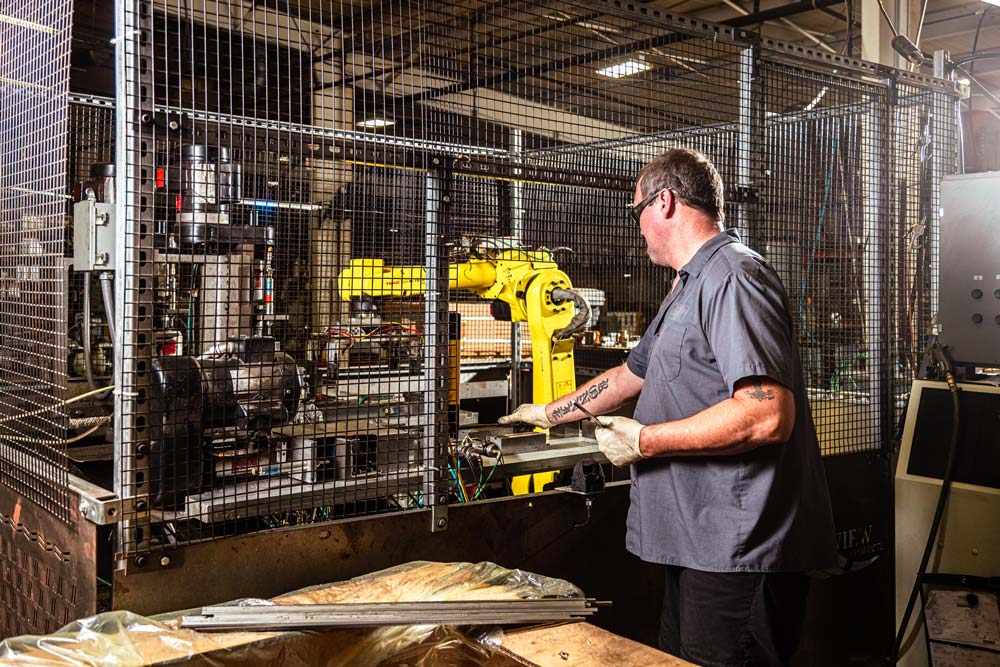 GP2-robot-with-op-3-cropped Your trusted source for quality powdered metal parts